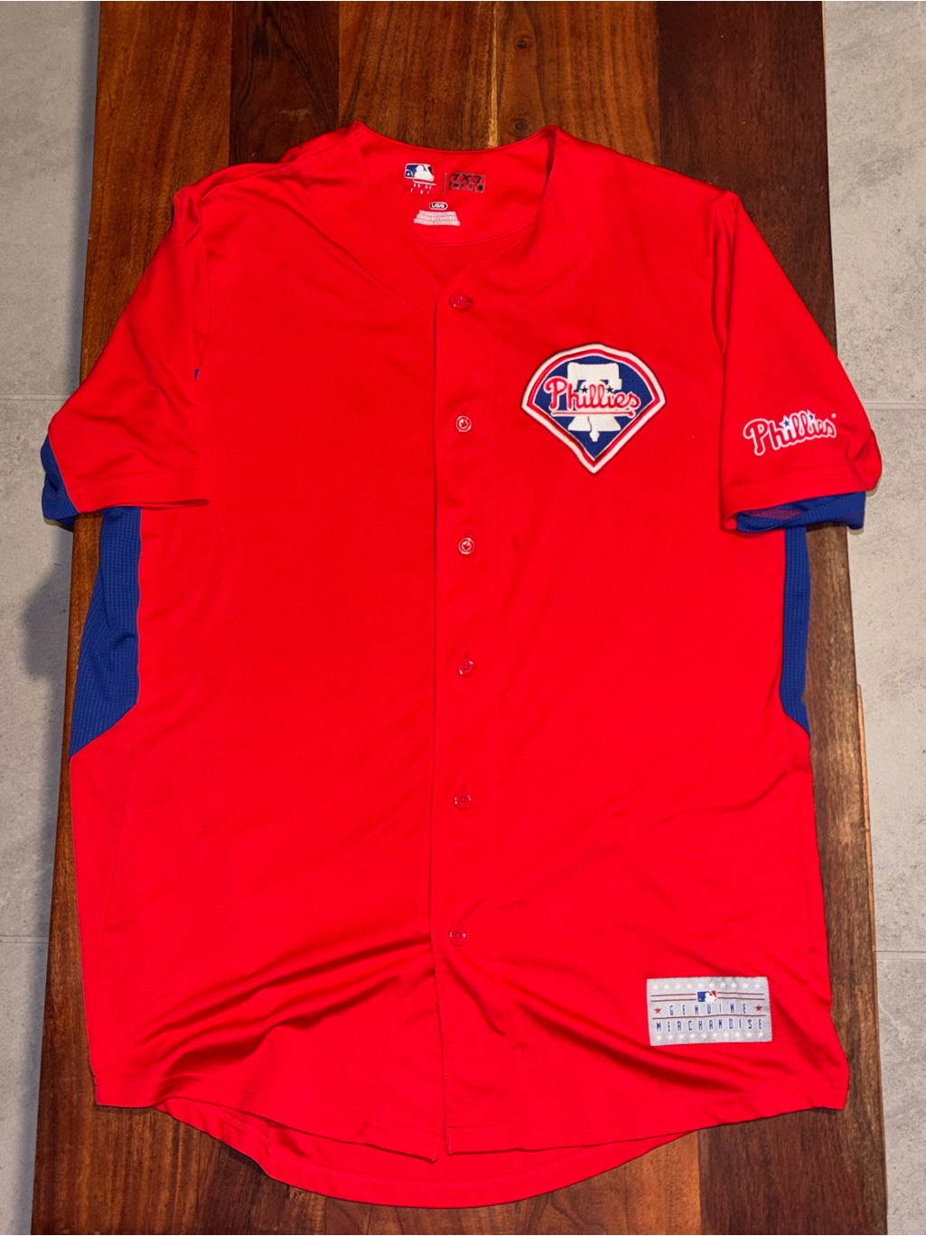 Genuine Merchandise Red ShortSleeve Fan Tee With Blue Logo